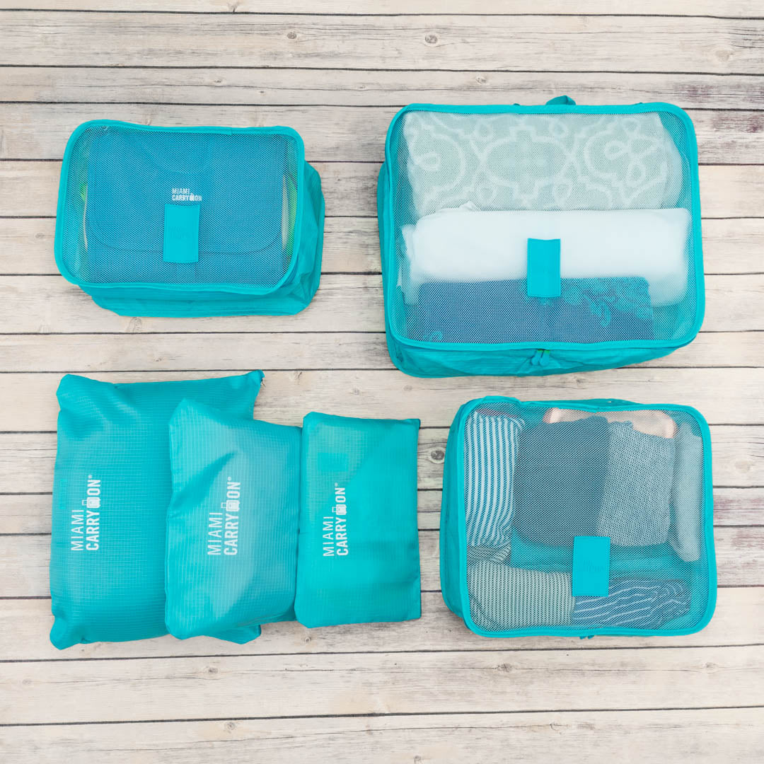 blue packing cube travel accessory by miami carry on 